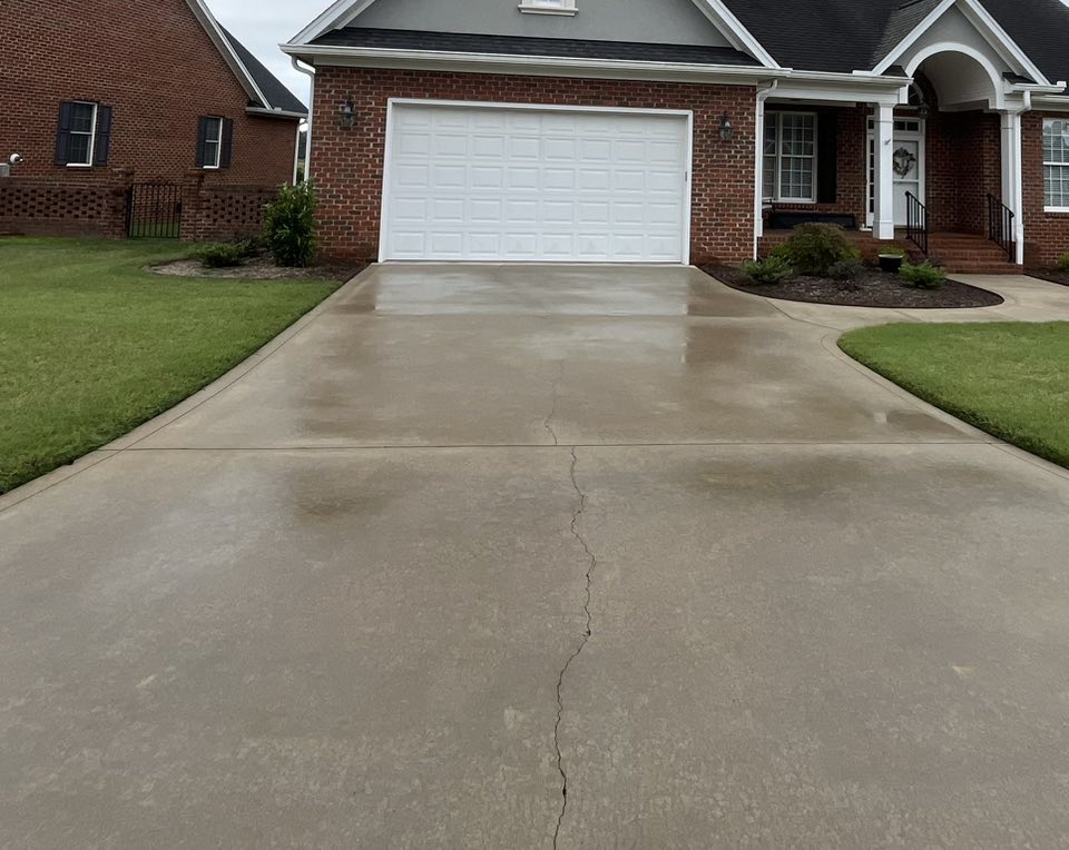 residential home after concrete driveway was cleaned