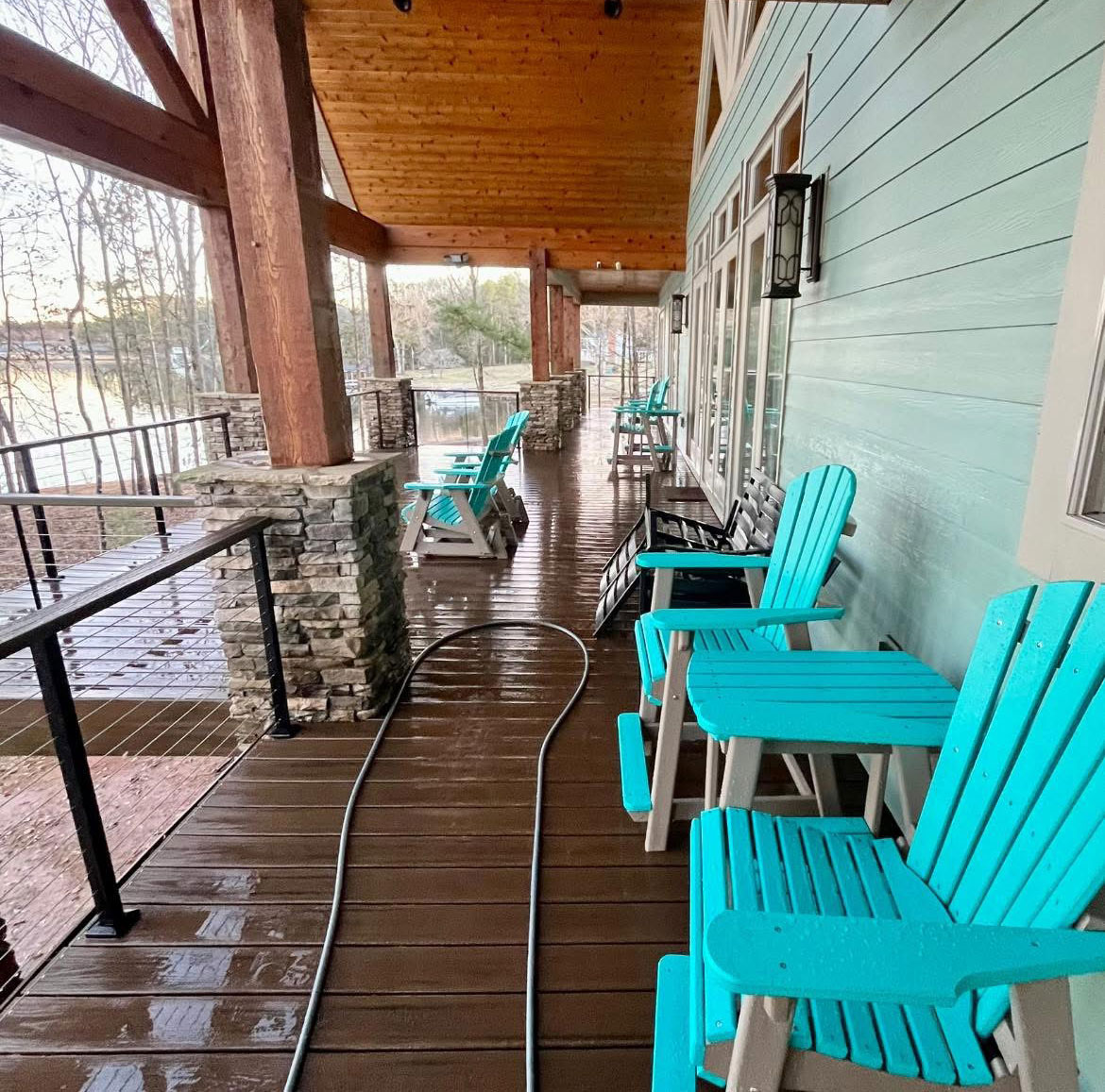pressure washing services in progress on the back deck of a customer's home
